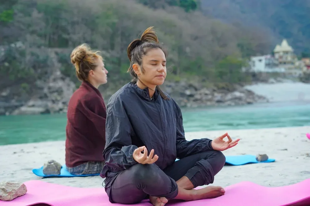 Quiet seated practice on the riverbank