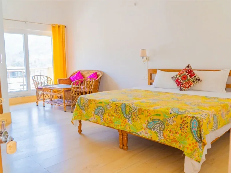 A bright bedroom at the retreat accommodation