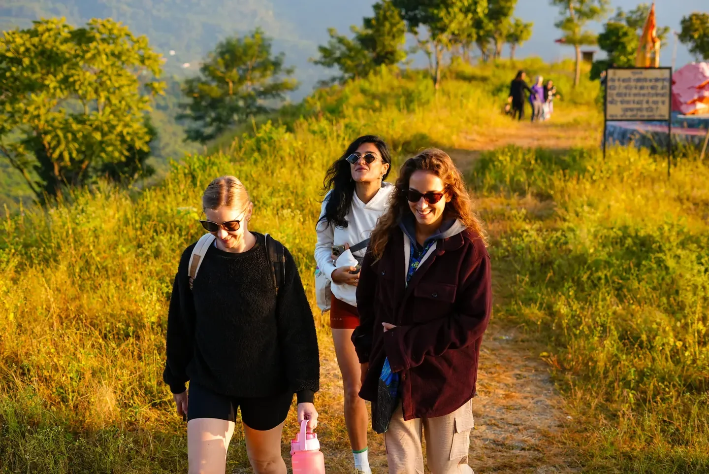 Participants walking through the Himalayan countryside